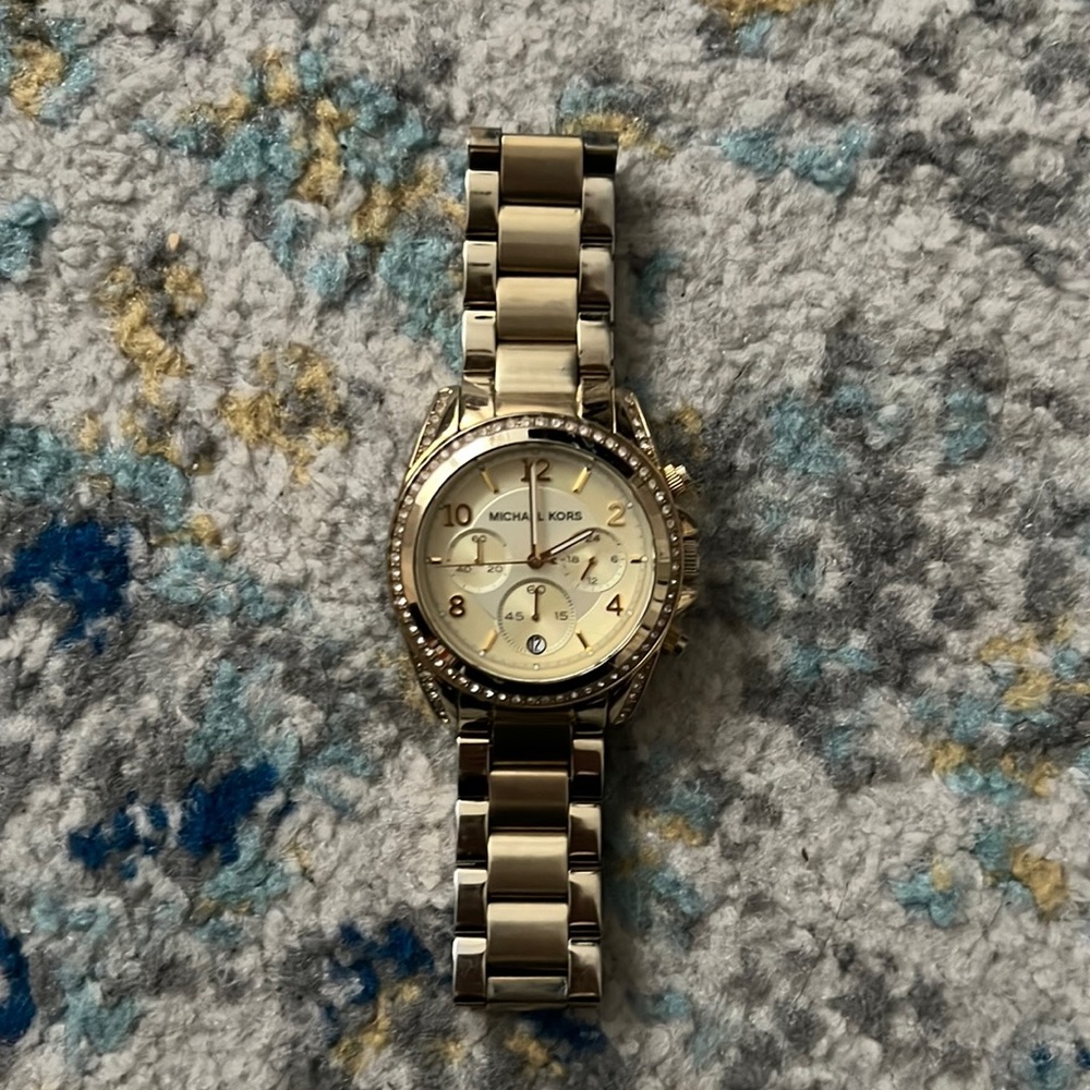 Michael Kors gold women’s watch